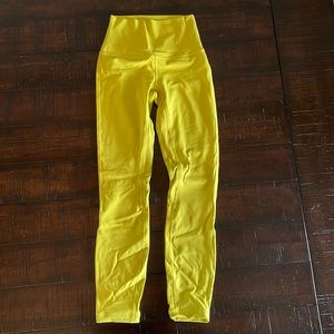 Highlighter colored Lululemon leggings